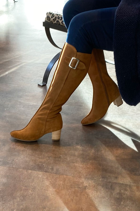 Dark brown women's knee-high boots with buckles. Round toe. Low flare heels. Made to measure. Worn view - Florence KOOIJMAN
